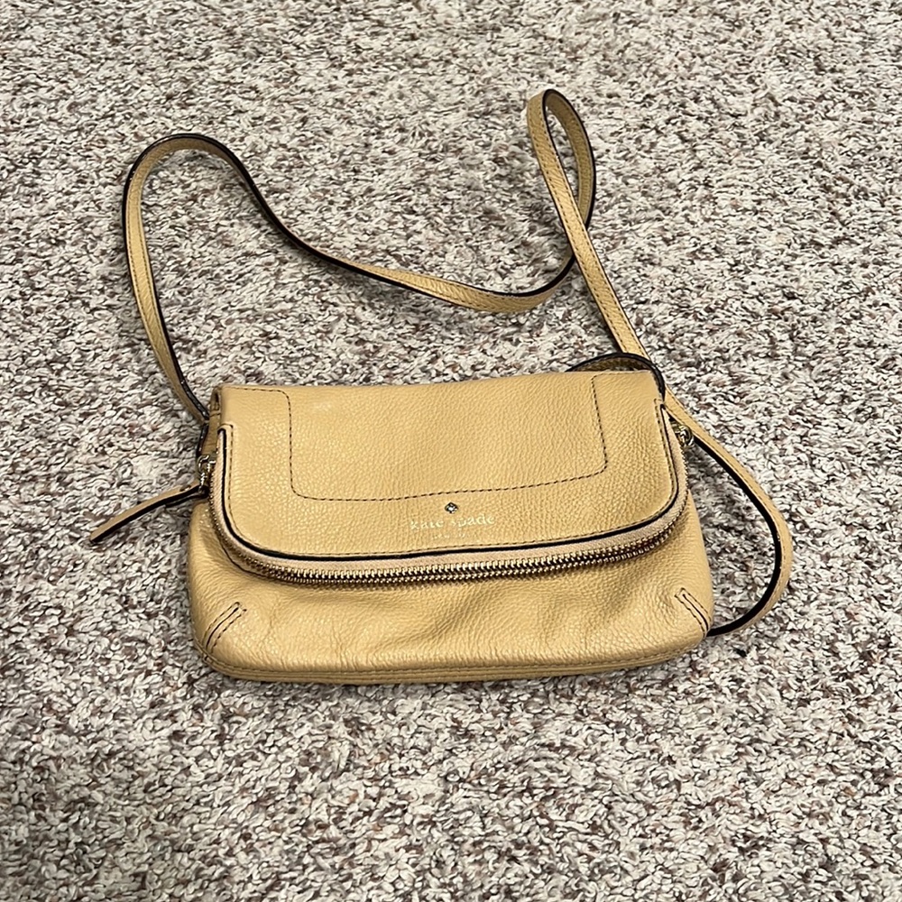 Kate Spade tan cross body purse.